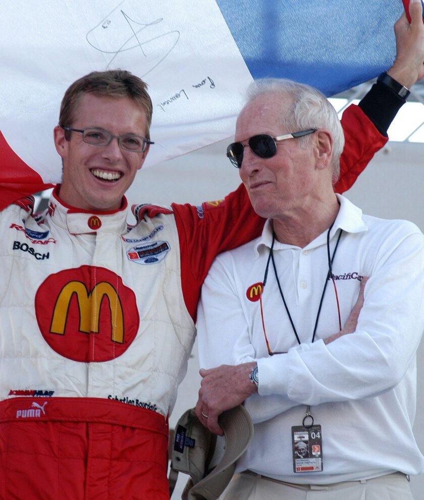 French Sebastien Bourdais celebrates with Paul Newman after winning the Champ Car final in Mexico